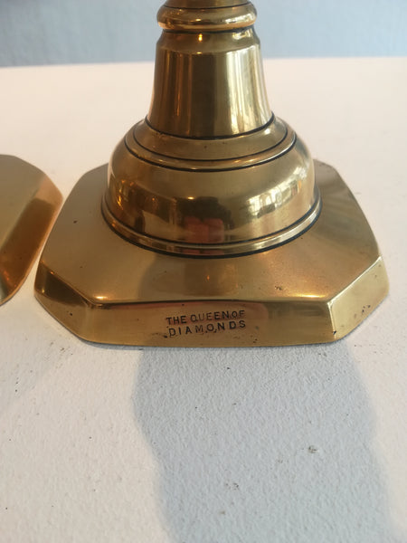 'Queen of Diamonds' brass candlestick pair.