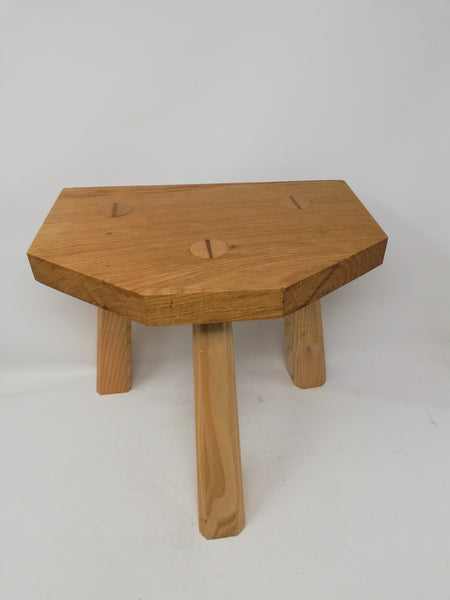 Traditional 3 legged wooden milking stool.