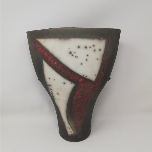 Mick Morgan raku form in red and black