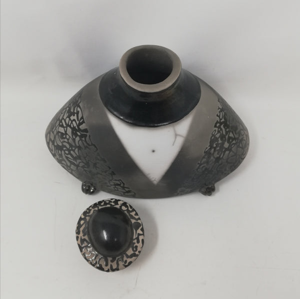 Mick Morgan -squat monochrome raku lidded vessel.
