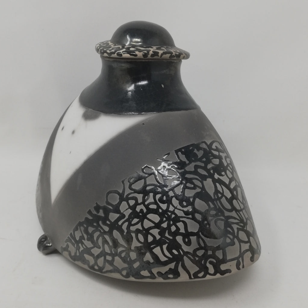 Mick Morgan -squat monochrome raku lidded vessel.