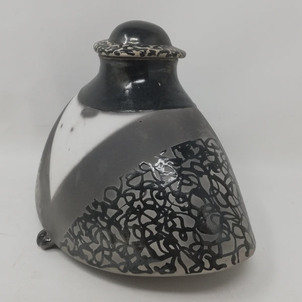 Mick Morgan -squat monochrome raku lidded vessel.