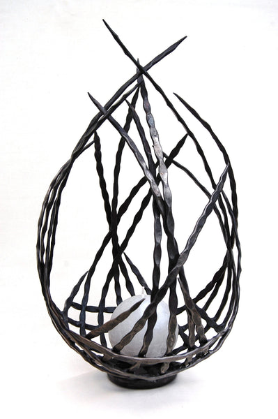 hand forged metal candle holder/sculpture by Aaron Petersen