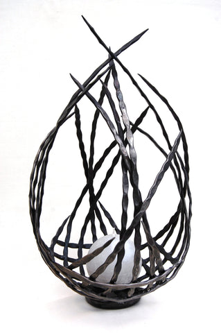 hand forged metal candle holder/sculpture by Aaron Petersen