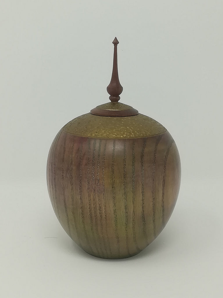 Turned wood ash jar with gold coloured detail and purple heart finial by Roderick Evans.