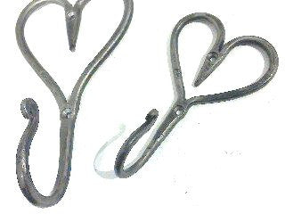 Hand forged ironwork - large and small metal heart hooks