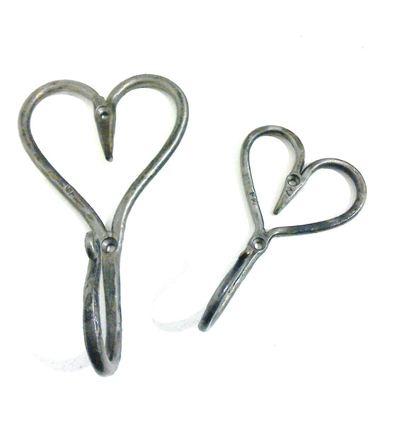 Hand forged ironwork - large and small metal heart hooks